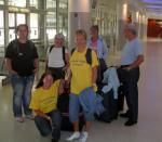 Group leaders and students at the airport